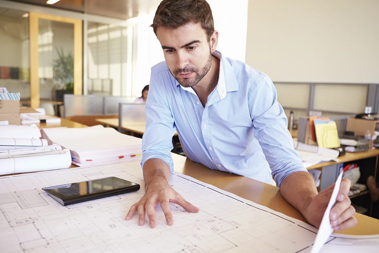 Architect reviewing plans